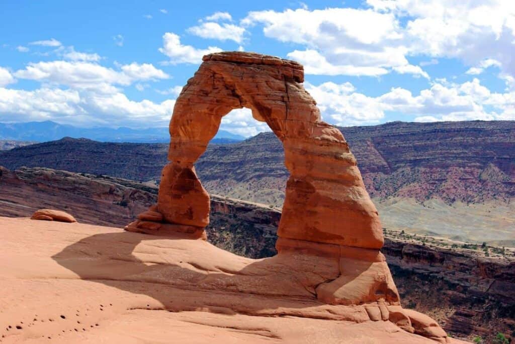 Delicate Arch in Arches National Park under a clear blue sky.