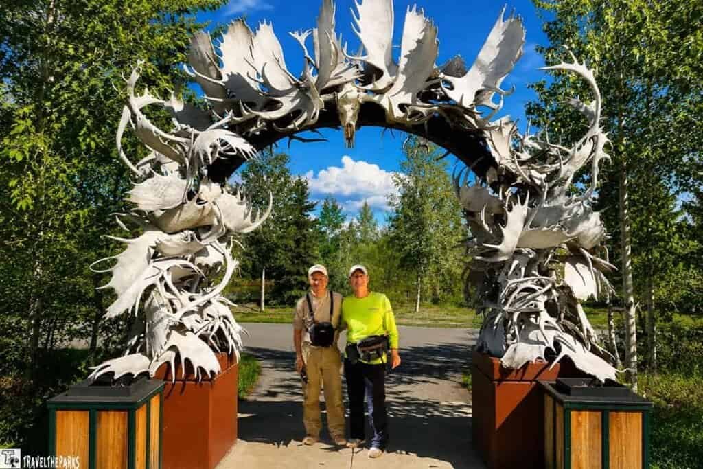 Antler Arch in Fairbanks with people standing under it