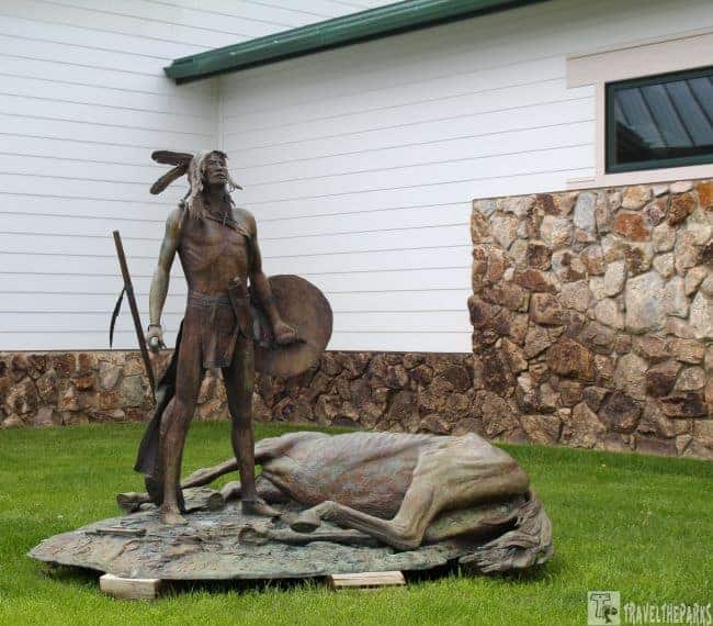 Bronze sculpture of Crazy Horse and his dying horse at the Welcome Center-Crazy Horse Memorial