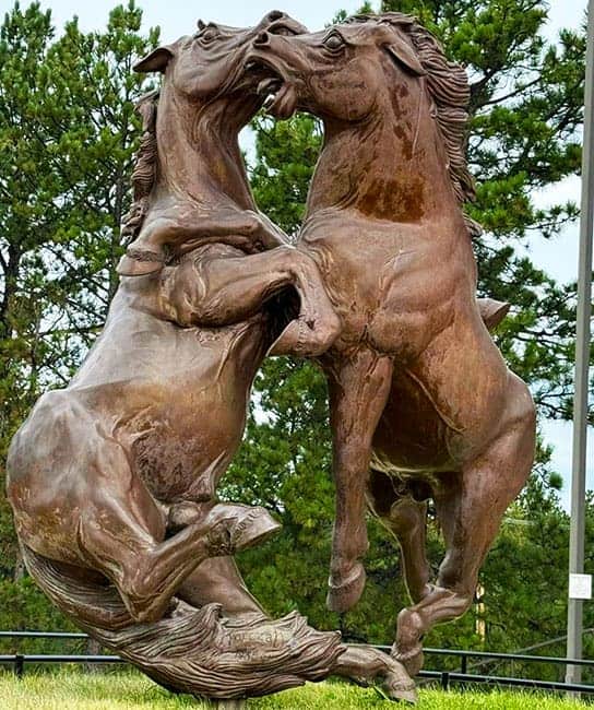 Fighting Stallions bronze sculpture by Korczak Ziółkowski at Crazy Horse Memorial in South Dakota