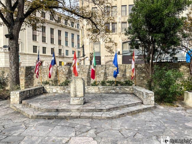 Iconic Texas flag display in the cavalry courtyard at the Alamo