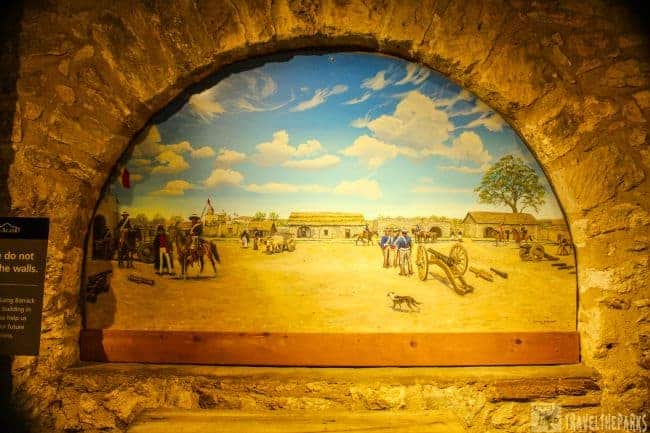 Mural of the Alamo painted on the wall of the long barracks