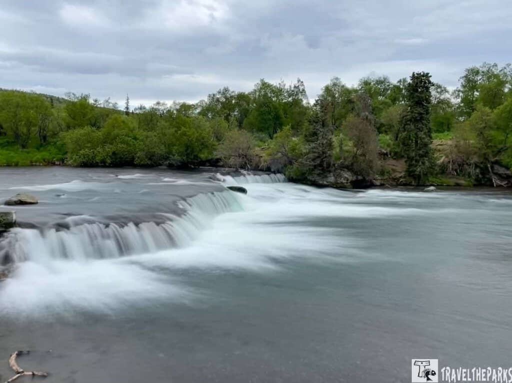 Water cascades over rocks at Brooks Falls at Katmai National Park