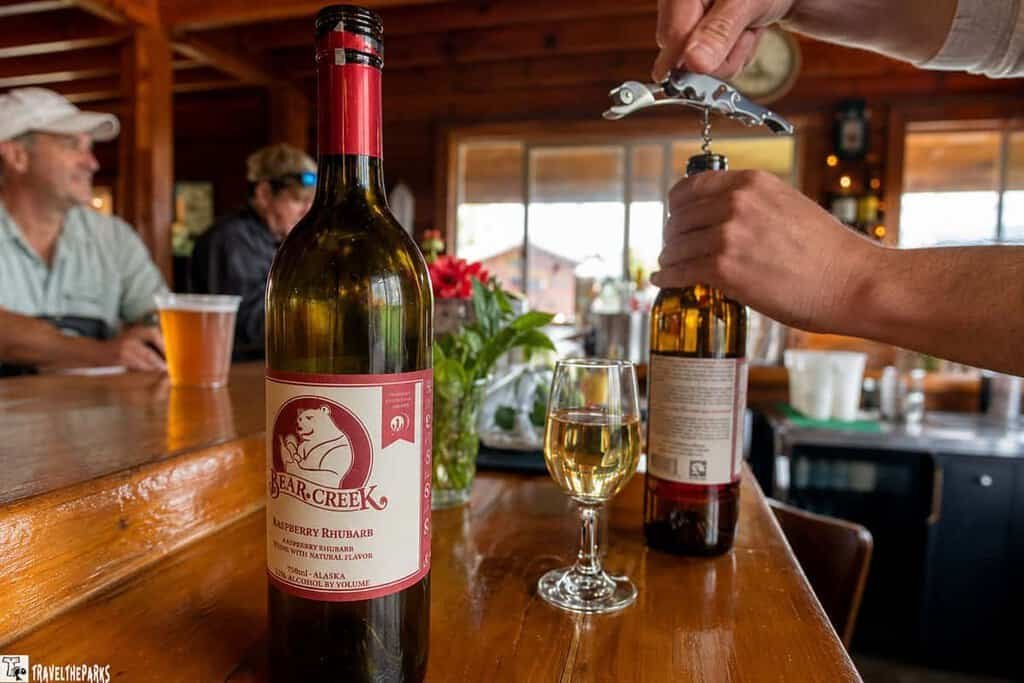 Black Bear Creek Wine with wine glass at the Brooks Lodge Dining Bar