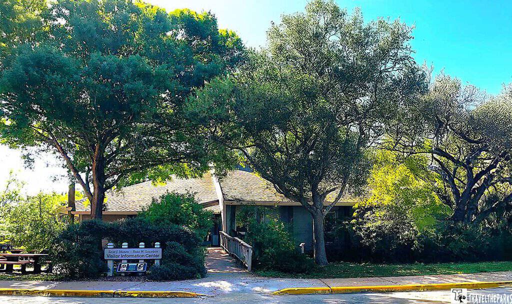 Visitor information center surrounded by trees at Merritt Island National Wildlife Refuge.