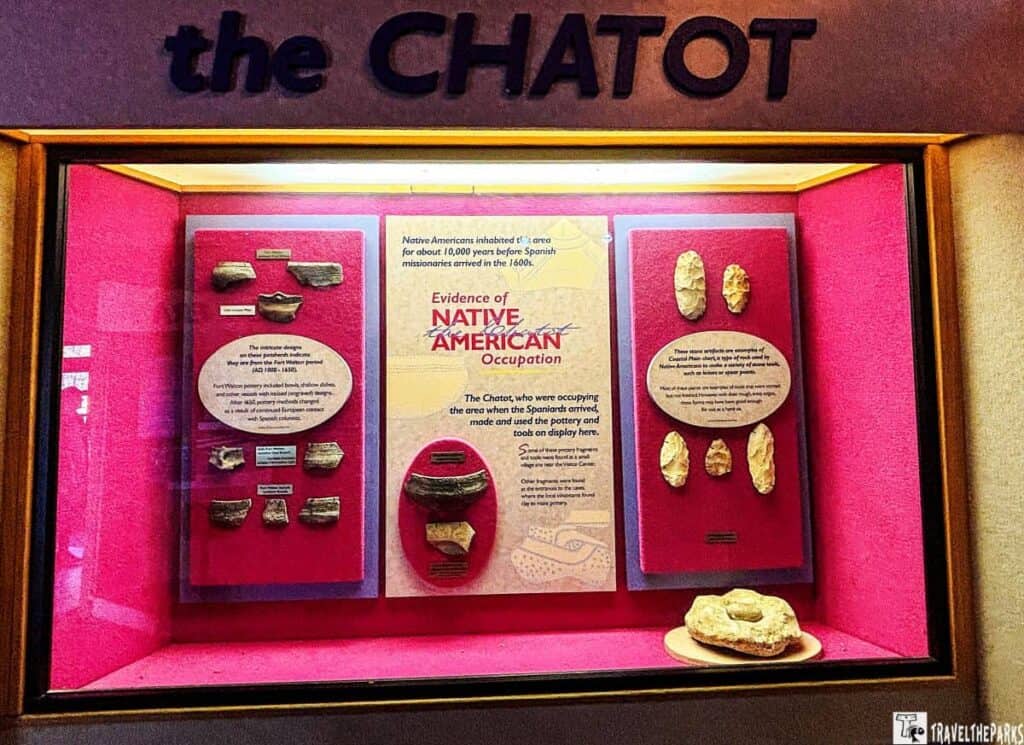 Exhibit titled "the CHATOT" displaying Native American pottery and stone artifacts.