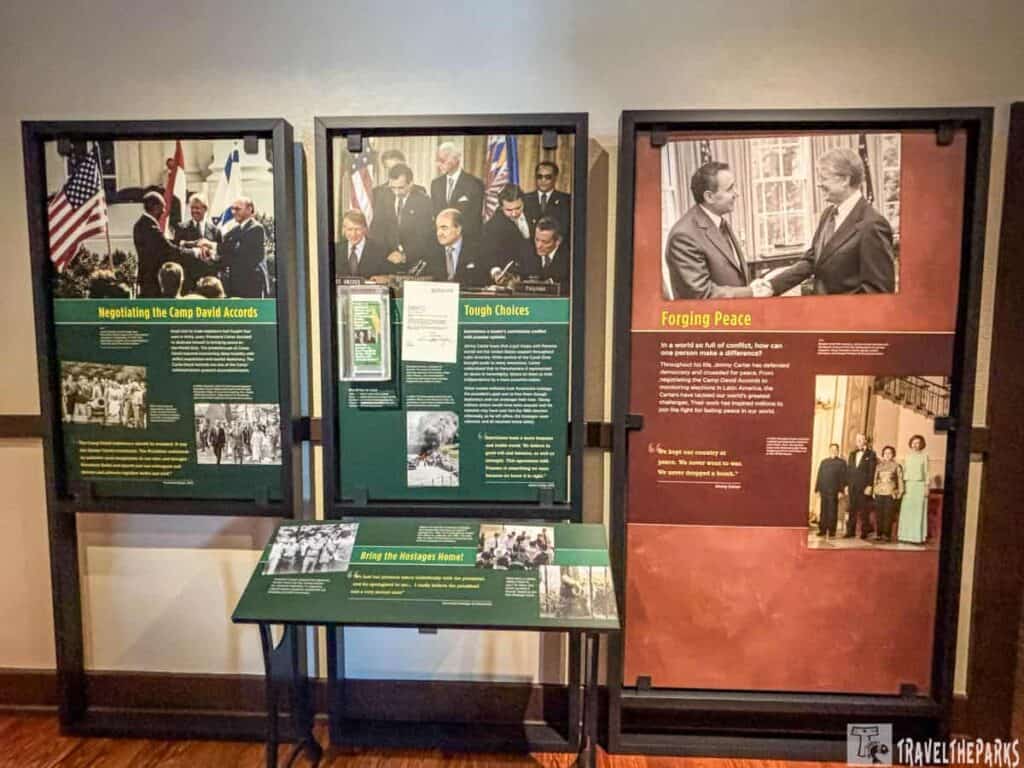 Educational panels about the Camp David Accords and peace negotiations featuring historical photos and text.