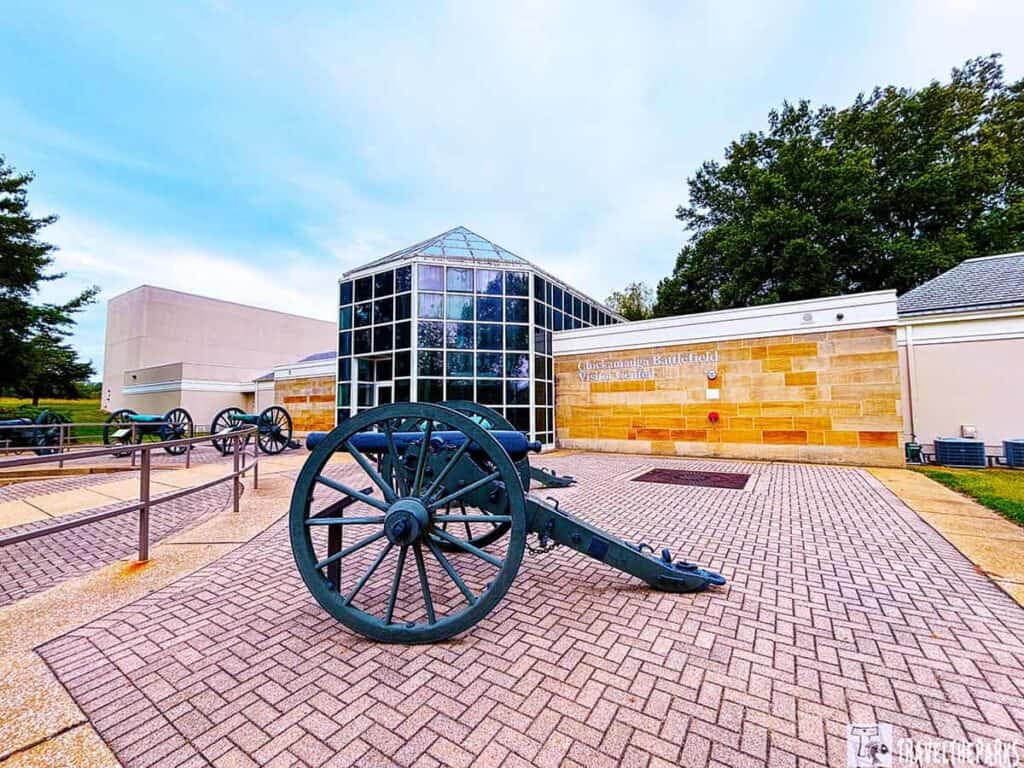 Chickamauga Battlefield Visitor Center with historic cannons displayed in the foreground.