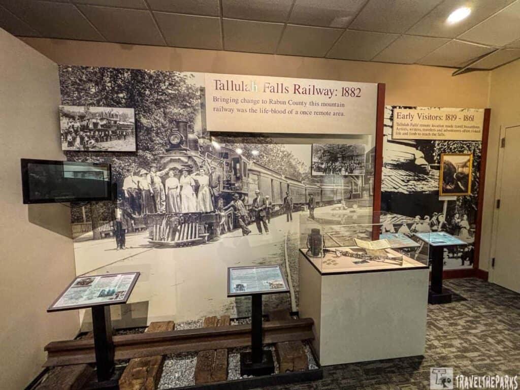 Exhibit on Tallulah Falls Railway featuring historical photos, text panels, and artifacts.