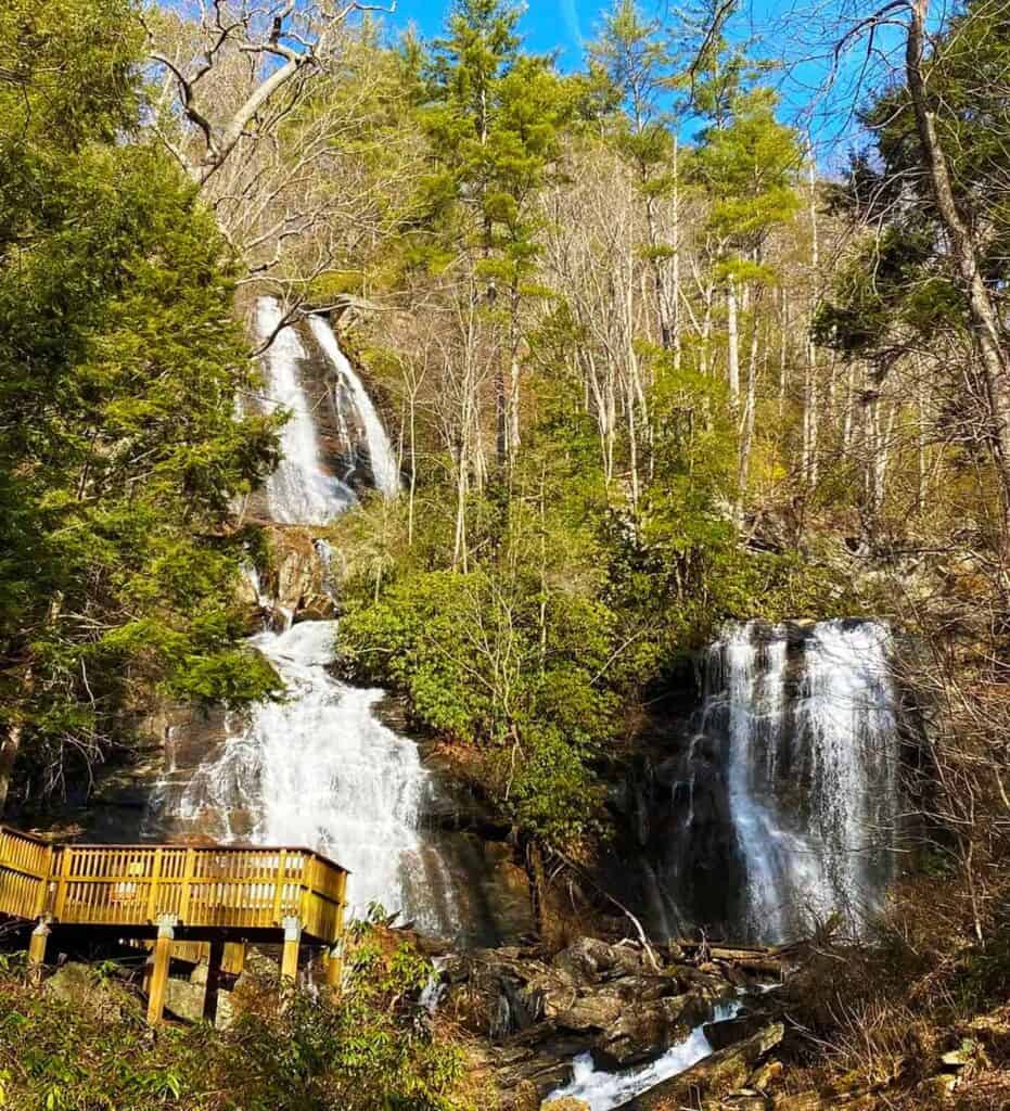 Anna Ruby Falls with a wooden observation deck and surrounding forest.