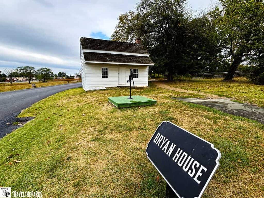 Small white house at Gettysburg National Military Park with a "BRYAN HOUSE" sign in the foreground.