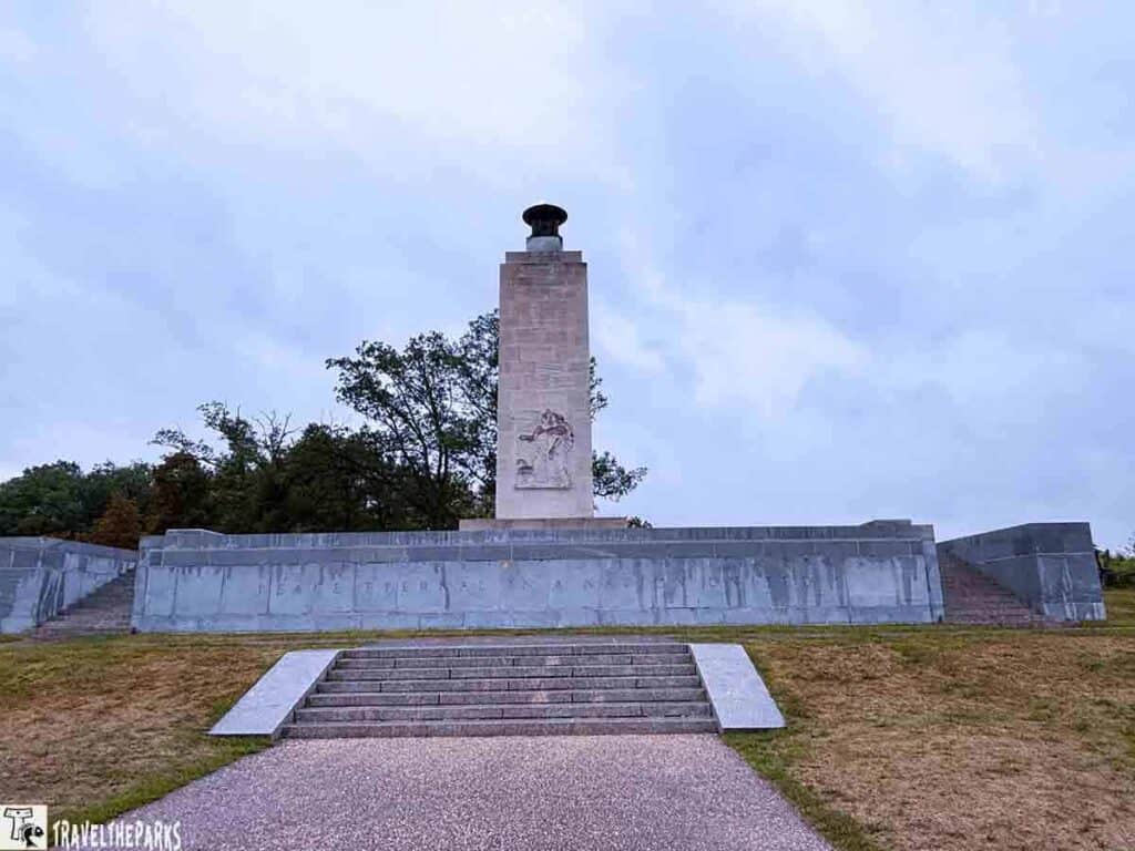 Eternal Light Peace Memorial at Gettysburg National Military Park with a tall stone monument and steps leading up to it.
