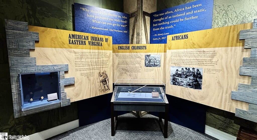 Exhibition display about American Indians of Eastern Virginia, English Colonists, and Africans, with informational panels, illustrations, and display cases.
