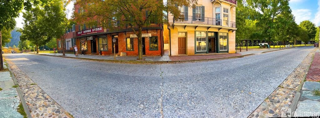 Street corner with historic brick buildings and a dry goods store in Harpers Ferry National Historical Park.