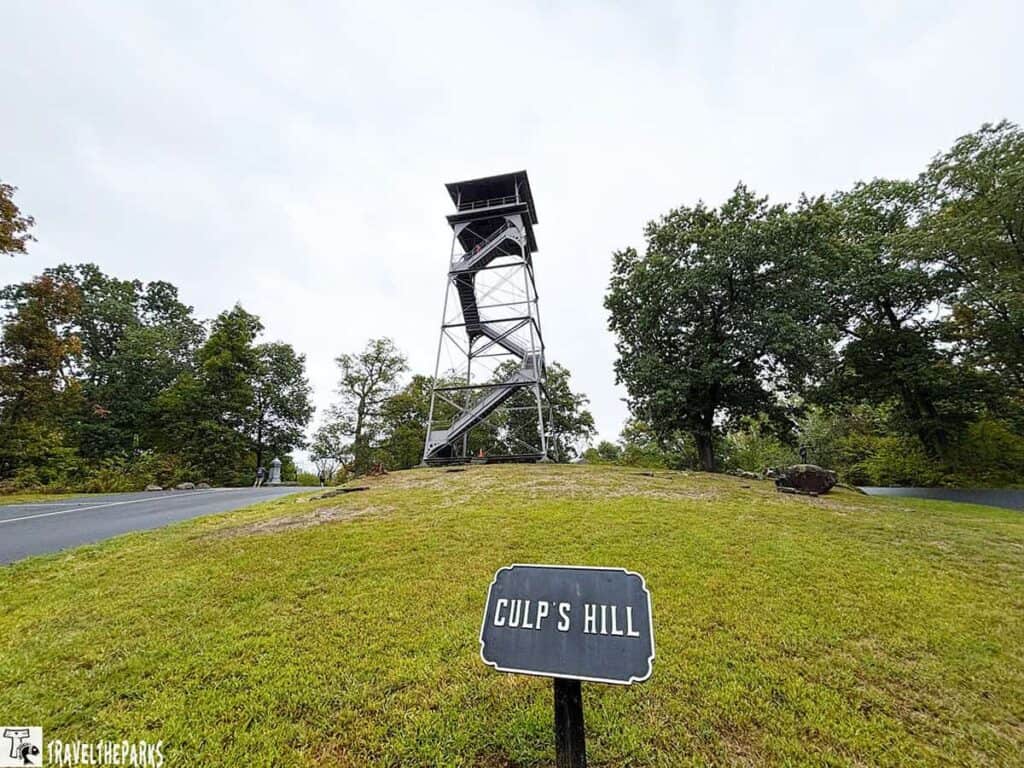Culp's Hill observation tower at Gettysburg with a surrounding grassy area and trees.