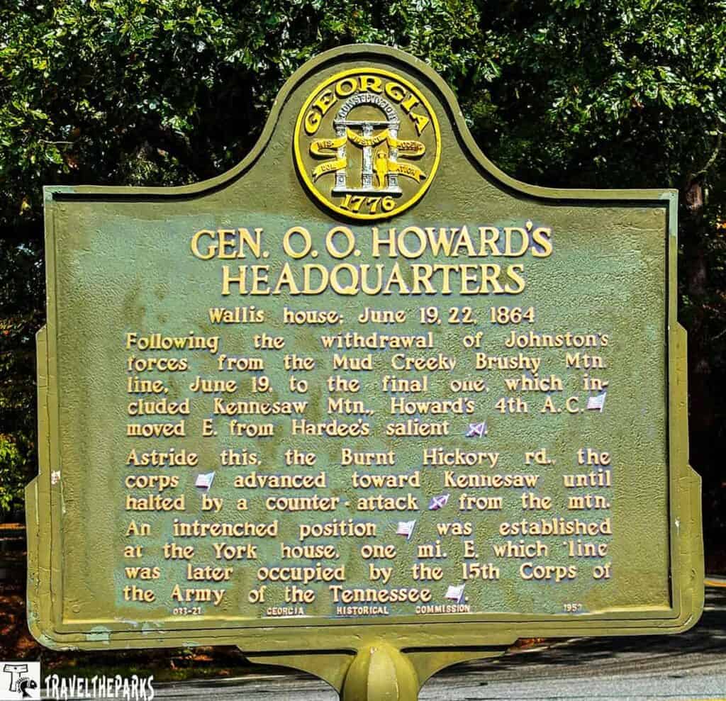 Historical marker for Gen. O. O. Howard's Headquarters with Georgia state seal.