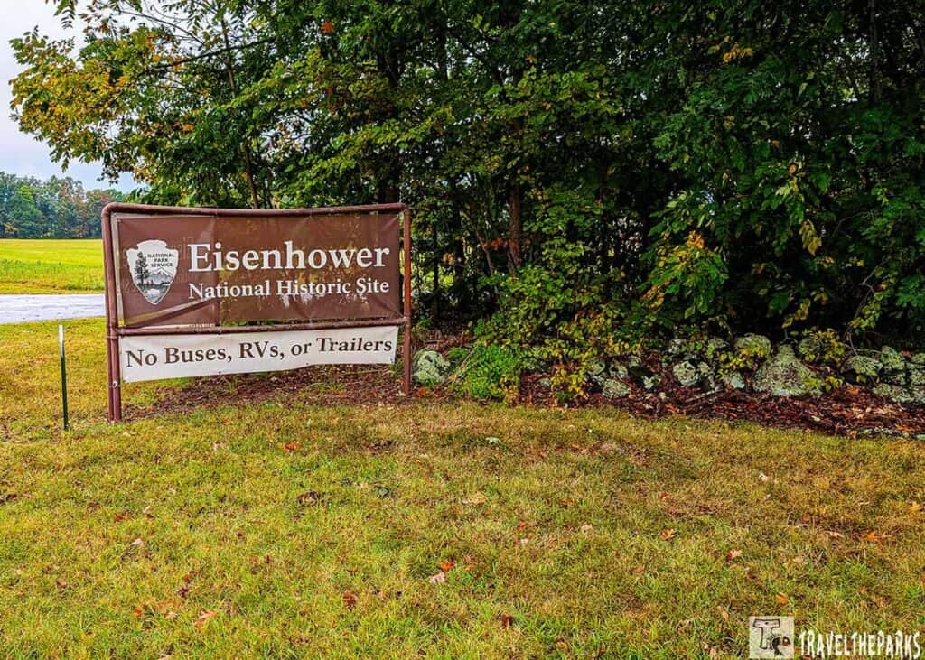 Sign for Eisenhower National Historic Site with trees in the background.