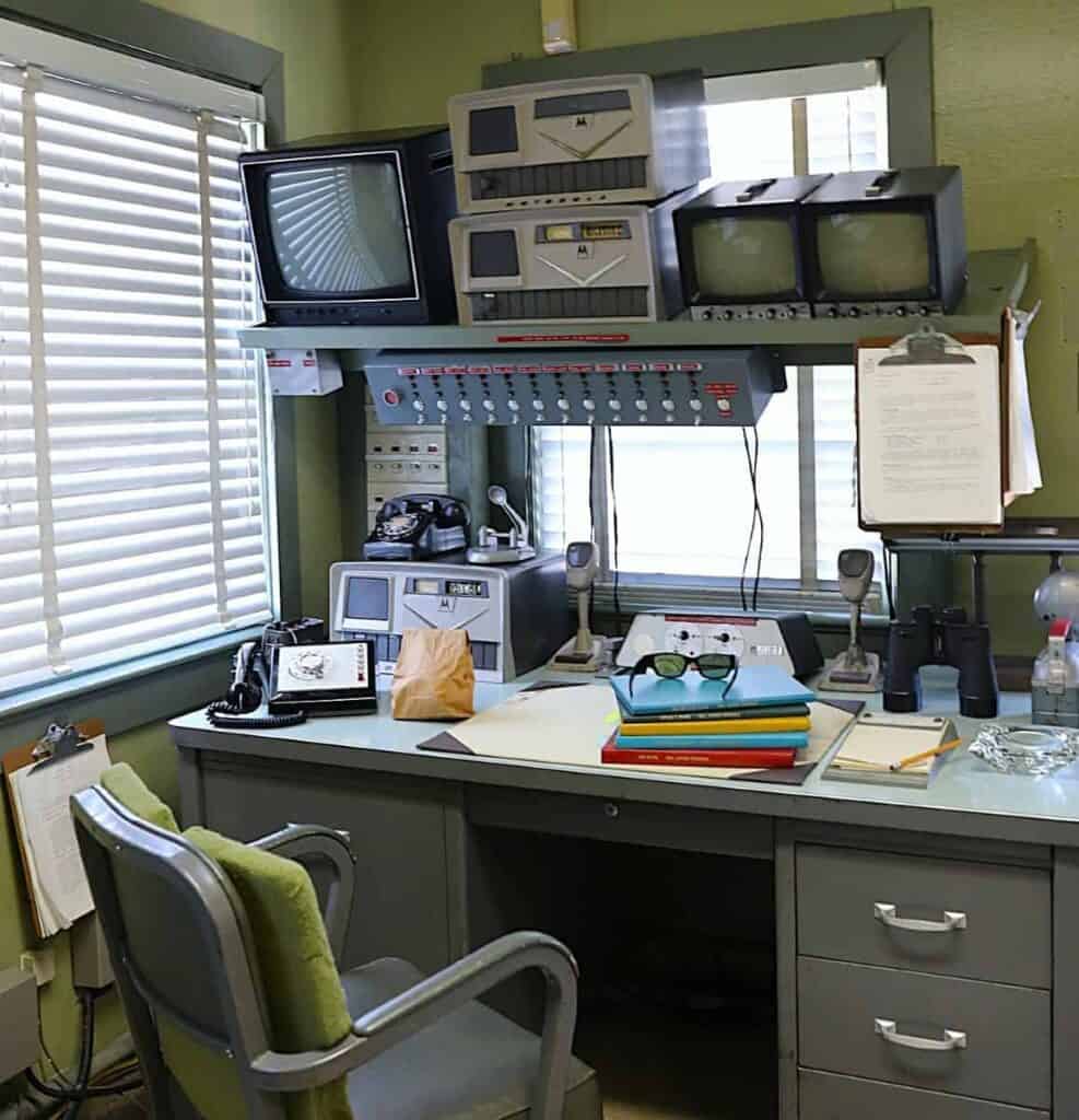 1960s office with vintage equipment and communication devices.