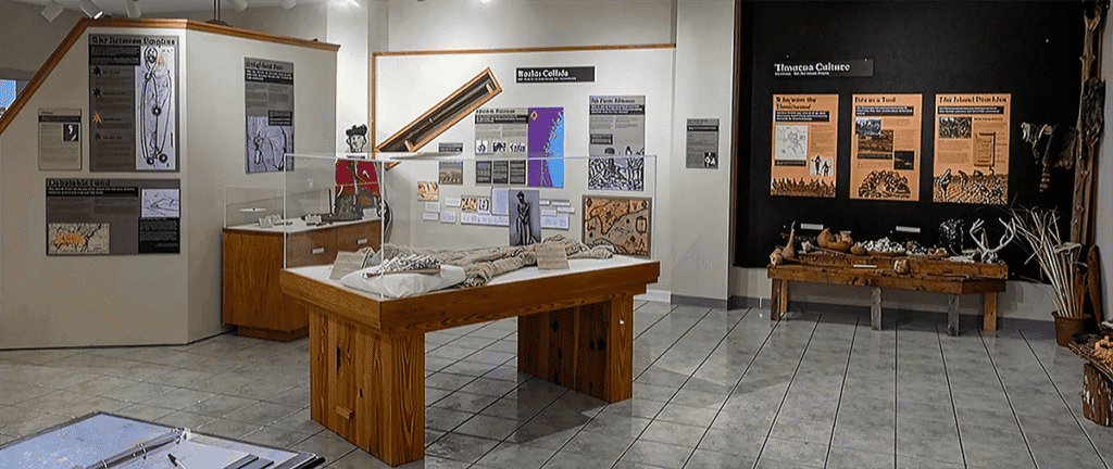 Cumberland Island National Seashore Museum exhibit room with display cases, informational panels, and artifacts.