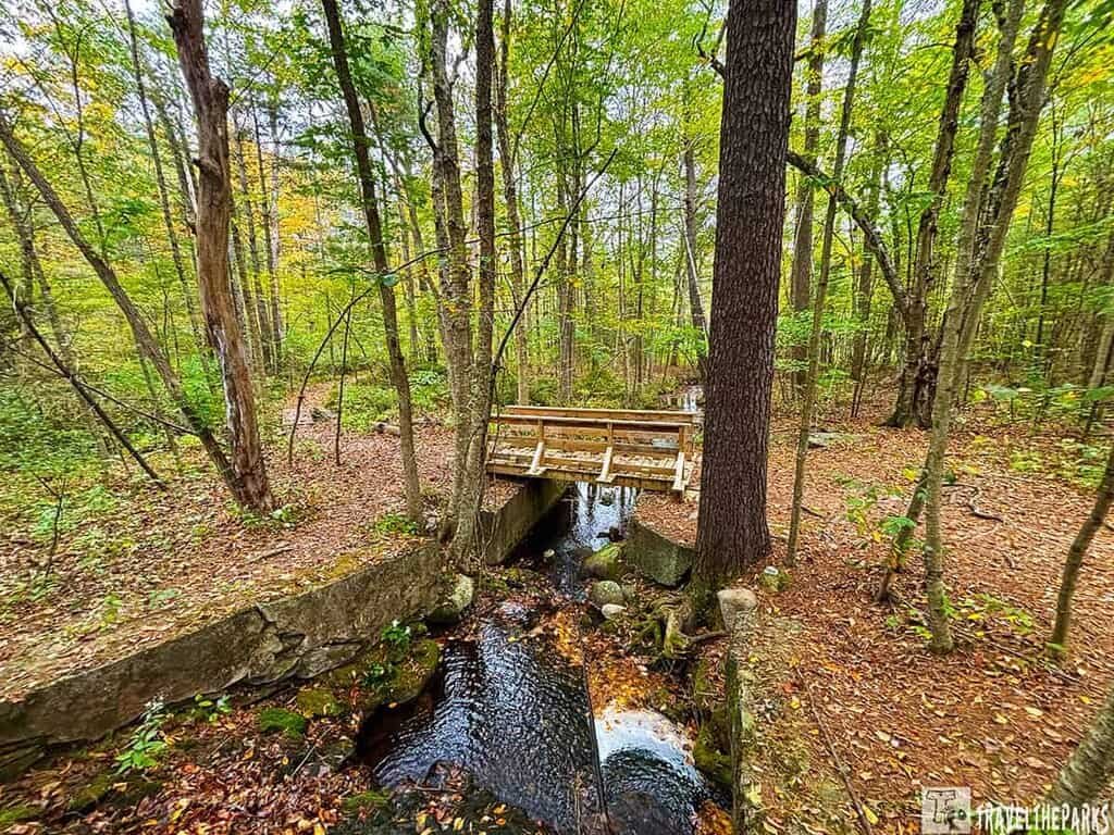The bridge abutments for the perimeter road from the POW era are visible here where the road crossed Tom’s Run.