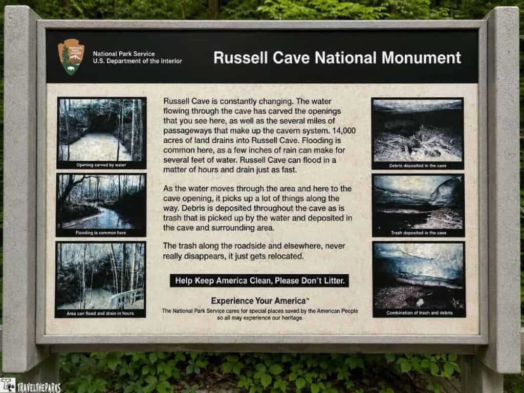 Sign for Russell Cave National Monument with illustrations of water flow, flooding, and debris in the cave, accompanied by environmental care messages.