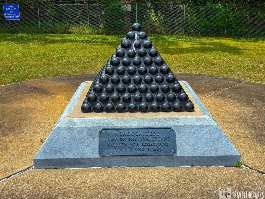 A pyramid monument of black cannonballs on a stone base, labeled with "Headquarters Army of the Cumberland Maj. Gen. W.S. Rosecrans Jan. 1 and 3 1863."

